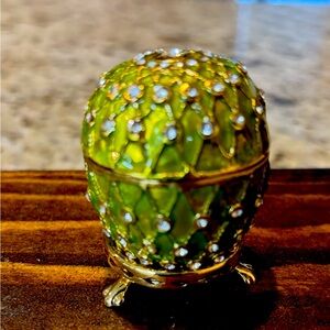 Replica Fabergé egg trinket box with stand.